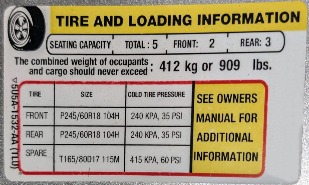Tire and Loading Information Sticker on a car