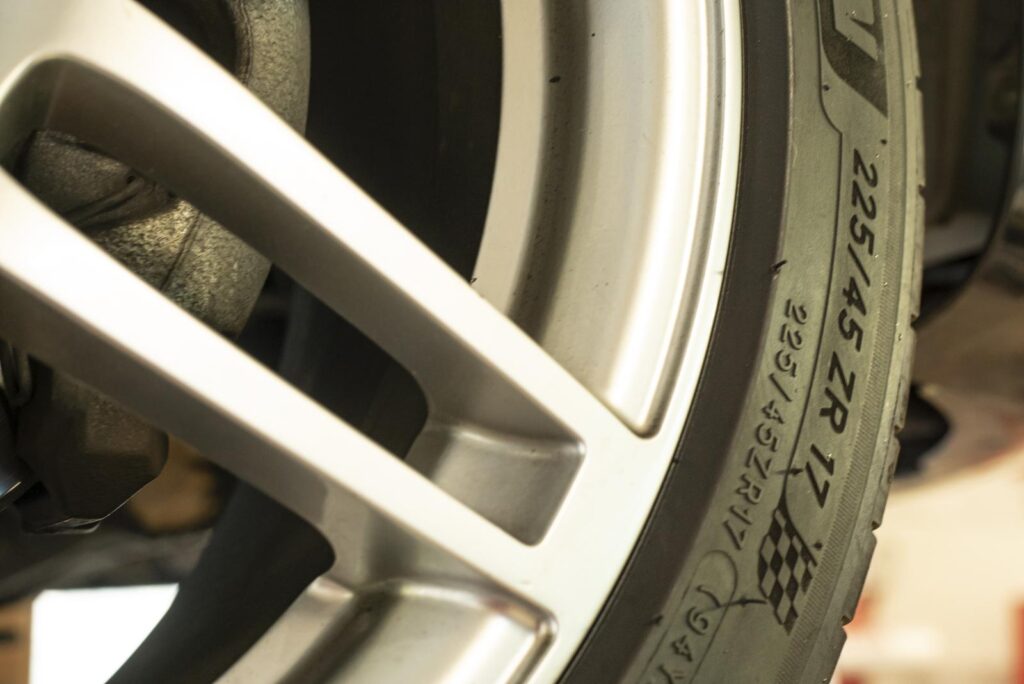 Tire sidewall markings (225/45 ZR 17) on a car