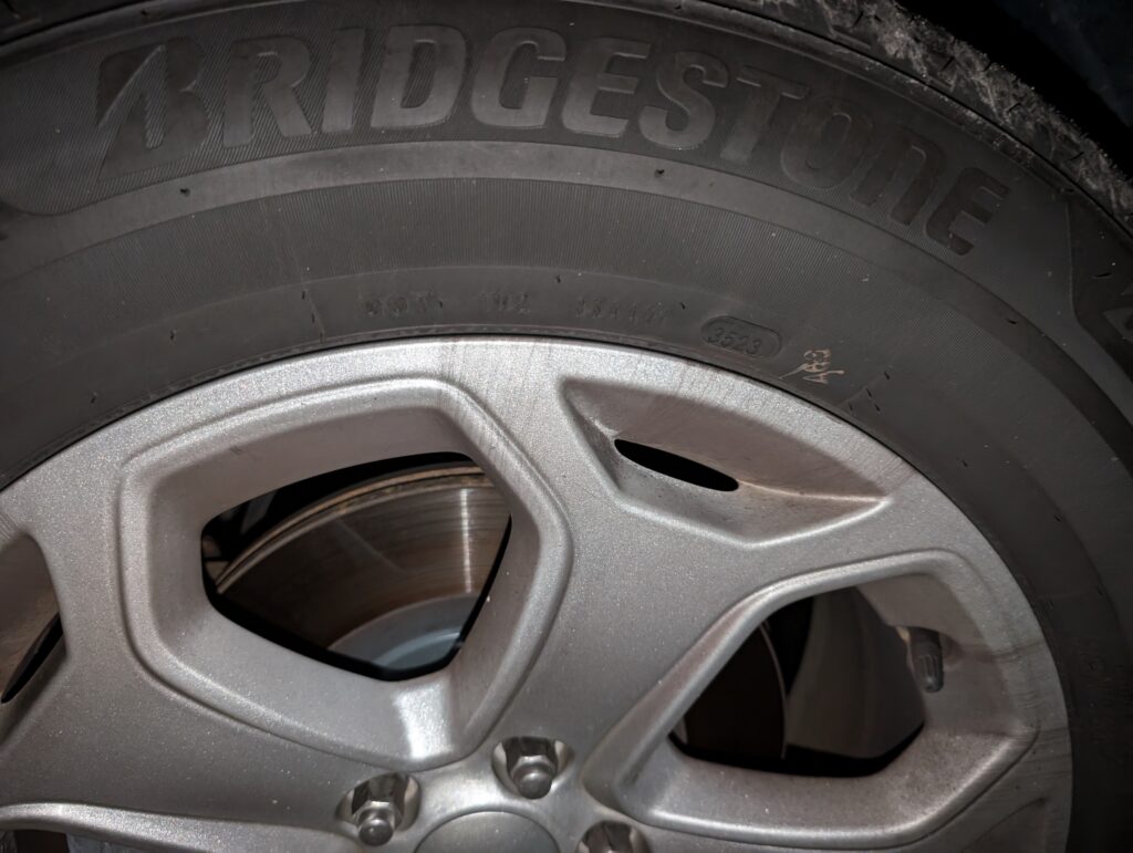 Side of a Bridgestone car tire