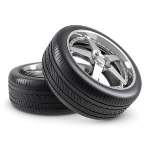 Image of two new tires stacked on top of each other - Essential Guide to Auto Tire Maintenance