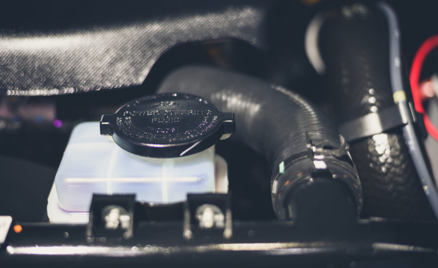 Power steering fluid reservoir in a new car