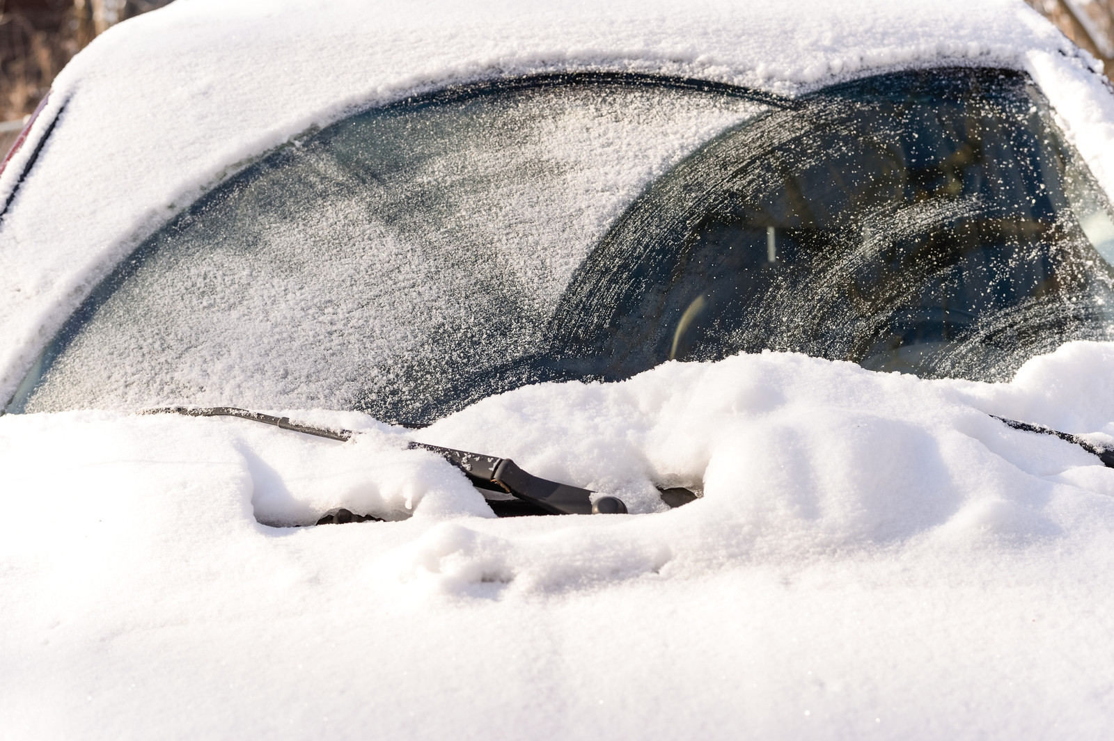 Snow on the windshield of a car