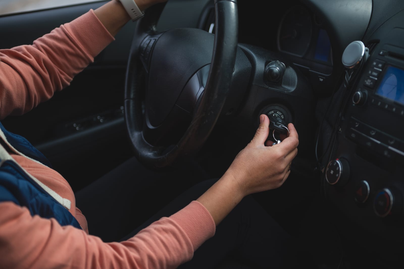 Person Starting A Car