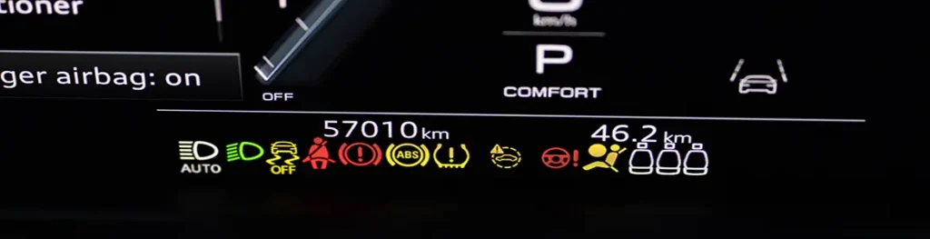 Many different car dashboard lights with warning lamps illuminated Light symbol that pops up on dashboard when something goes wrong with the engine Close up shot of hybrid car instrument panel