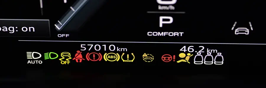 Many different car dashboard lights with warning lamps illuminated Light symbol that pops up on dashboard when something goes wrong with the engine Close up shot of hybrid car instrument panel