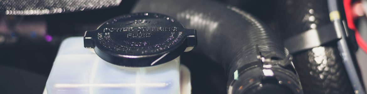 Power steering fluid reservoir in a new car