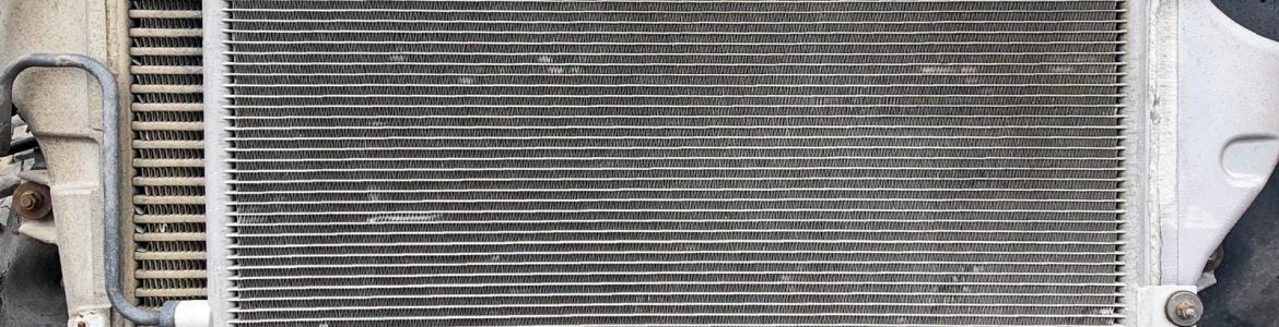 Scrap Metal Used Car Radiators in a Scrap Yard Used Car Radiator for Recycling in a Car Dump